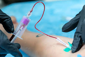 Sports performance blood testing kit by Elite Player Performance on a clean background with vials and testing equipment visible.